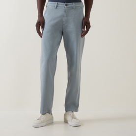 Model wearing Hugo Boss Orange Open Grey straight jeans, styled with white low-top trainers. Slim relaxed fit, clean front.