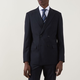 Model wearing Hugo Boss Houston Double-Breasted Suit Jacket in dark blue, styled with white shirt and striped blue tie.