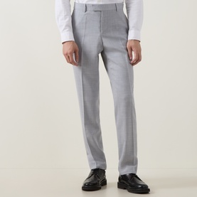 Model wearing Hugo Boss Open Grey slim-fit trousers, styled with a white shirt and black leather loafers