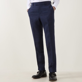 Model wearing Hugo Boss dark blue tailored trousers with a slim fit, styled with a white shirt and black leather shoes.