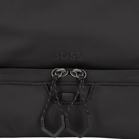 Hugo Boss black polyester wash bag, close-up of silver-tone hardware fastenings and debossed logo detail