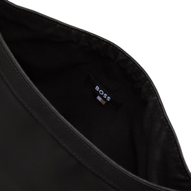 Hugo Boss black polyester wash bag, interior view showing BOSS logo label and spacious main compartment
