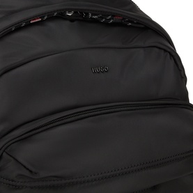 Hugo black polyester backpack, close-up showing embossed logo, quilted front pocket with red zip detail