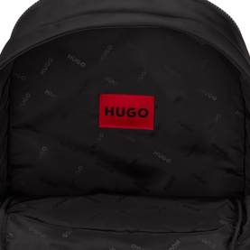 Hugo black polyester backpack interior showing red logo label and Hugo-branded lining pattern