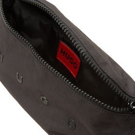 Hugo black polyamide bum bag, open top view showing red logo interior label, embossed HUGO lettering on exterior, silver zip hardware