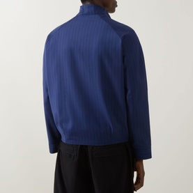 Model wearing Hugo Kamilo263X Tonal Striped Jacket in Open Blue, rear view showing tonal stripe detail, funnel neck and rear darting