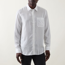 Model wearing Hugo Erillo Striped Shirt in Natural, white cotton with pinstripe pattern, point collar, chest patch pocket, long sleeves