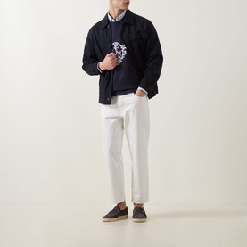 Model wearing Hugo Dark Blue cotton crew neck sweatshirt with navy jacket, white trousers and dark espadrilles.