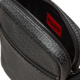 Hugo black crossbody bag open showing red branded lining, all-over monogram pattern, silver-tone zip and structured top