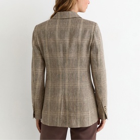 Model wearing Reiss neutral check blazer, rear view, single-breasted with welt pockets, styled with brown trousers