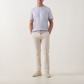 Model wearing Eleventy Girocollo Solid T-Shirt in grey with cream chinos and white trainers
