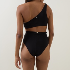 Model wearing Max Mara black high-waist bikini brief with matching one-shoulder top, gold stud detail, rear view.