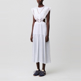 Model wearing Claude Pierlot Womens French Dress in light print, white broderie midi with cut-out waist detail and V-neck, styled with navy sandals