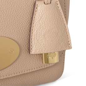 Mulberry Lily Small Crossbody Bag in Crumpet pebbled leather, close-up of gold-tone postman's lock closure and hanging fob with padlock detail.