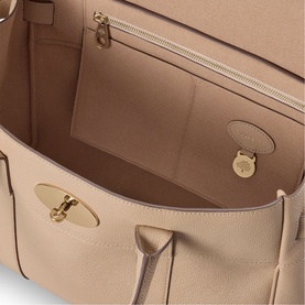 Mulberry Bayswater Small Top Handle Bag in Crumpet, interior view showing main compartment, zip pocket, slip pockets and soft gold-tone hardware