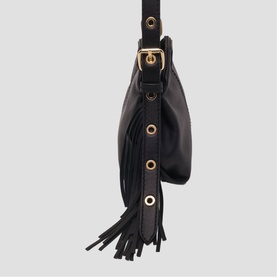 Maje black leather crossbody bag with gold-tone hardware, eyelet detail, and tassel fringe trim, adjustable shoulder strap.