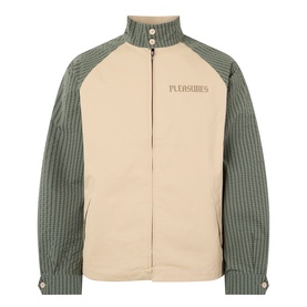 Pleasures beige casual jacket with green checked raglan sleeves, zip front, stand collar, and embroidered logo chest detail