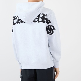 Model wearing Pleasures grey cotton hoodie, back view, bold black Gothic script graphic across shoulders and sleeves