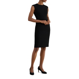 Model wearing Hobbs black sleeveless crew-neck sheath dress, styled with black heels