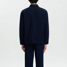 Model wearing Selected Dark Blue Denim casual shirt, rear view, styled with matching navy trousers