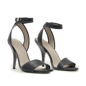 All Saints black leather stiletto heeled sandals with open toe and ankle strap buckle fastening, beige insole visible.