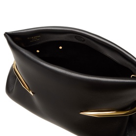 Givenchy Pinch Soft Leather Clutch in black lambskin, open top view showing gold-tone pinch hardware detail and interior lining