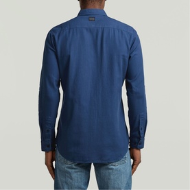 Model wearing G-Star Slim Shirt in Rank Blue GD, rear view, styled with light blue denim jeans