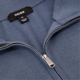 Reiss airforce blue zip-up sweatshirt, close-up of silver zip and branded label detail.
