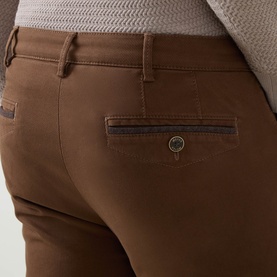 Meyer brown cotton trousers close-up showing rear pocket with contrast navy trim detail and branded button