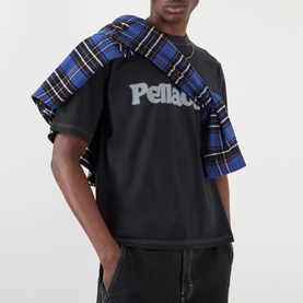 Model wearing Pellador Logo Print T-Shirt in black with blue tartan shirt draped over shoulders, round neck, short sleeves, logo detail to chest.