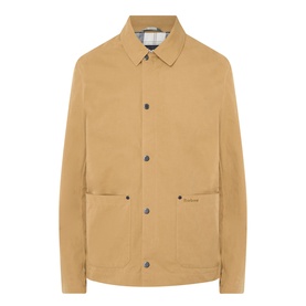 Barbour Bayfield Logo Overshirt in Camel, point collar, snap button placket, two large patch pockets, straight hem