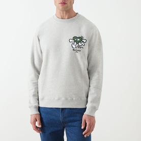 Model wearing Barbour Grey Marl cotton crew neck sweatshirt with green graphic print, styled with blue jeans.