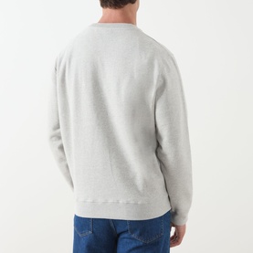 Model wearing Barbour Grey Marl cotton crew neck sweatshirt, back view, styled with blue jeans.