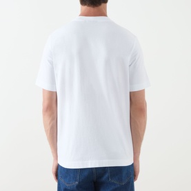 Model wearing white crew neck short-sleeve T-shirt, rear view, styled with blue denim jeans