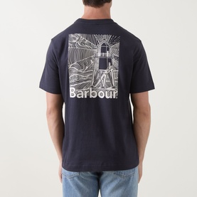 Model wearing Barbour Moonwell Graphic Logo T-Shirt in Dark Navy, showing rear lighthouse graphic print on soft cotton jersey.