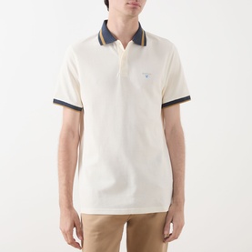 Model wearing Barbour Anthorn Textured Logo Polo Shirt in Whisper White with navy tipped collar and cuff trims, paired with tan chinos.