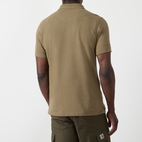Model wearing Barbour clay cotton polo shirt, back view, styled with khaki cargo shorts