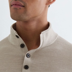 Model wearing Reiss stone moulin&eacute; top, close-up of mandarin collar with dark button placket detail.