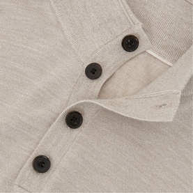 Reiss stone moulin&eacute; knit top with dark button placket detail, close-up view showing collar and button fastening.