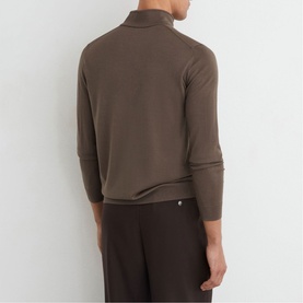 Model wearing Reiss ridge brown roll-neck top, styled with dark brown wide-leg trousers, rear view.
