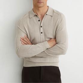 Model wearing Reiss stone moulin&eacute; knit polo shirt with ribbed texture and button placket, styled with dark trousers
