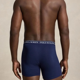 Model wearing Ralph Lauren Three-Pack Logo Boxer Briefs in navy, showing rear view with signature logo elasticated waistband.