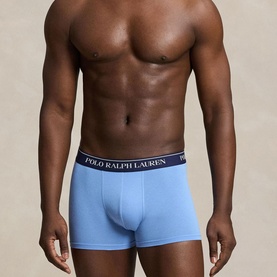 Model wearing Ralph Lauren Classic Stretch Trunk 3-Pack in Bristle Blue, logo elastic waistband, contoured pouch, part of a 3-pack set
