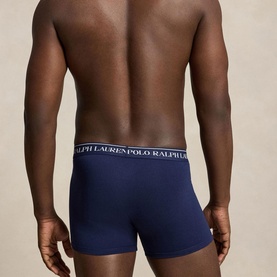 Model wearing Ralph Lauren Classic Stretch Trunk 3-Pack in navy, showing rear view with signature logo elastic waistband.