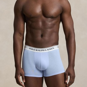 Model wearing Ralph Lauren Classic Stretch Trunk 3-Pack in pebble blue with signature logo elastic waistband
