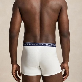 Model wearing Ralph Lauren Classic Stretch Trunk 5-Pack in white with navy logo elastic waistband, rear view showing trunk cut fit.