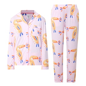 Chelsea Peers Toucan Print Long Pyjama Set in multicolour, two-piece with revere collar top and straight-leg trousers, contrast piping throughout