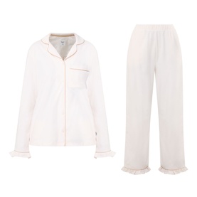 Chelsea Peers Just Married Frill Long Pyjama Set in white with contrast piped trims, frill cuffs, notched lapels, and matching wide-leg trousers.