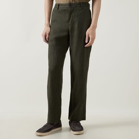 Model wearing Rodd & Gunn Spencer Bay Linen Trousers in Dark Olive, styled with dark brown loafers. Straight-leg cut with belt loops.