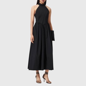 Model wearing All Saints black halterneck midi dress with gathered skirt, styled with black strappy heels and clutch bag